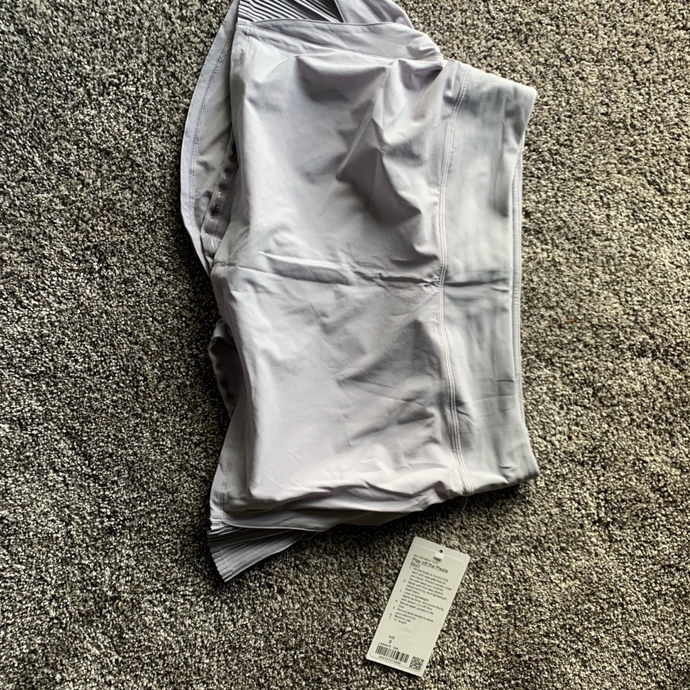 Lululemon “play off the pleats skirt”
